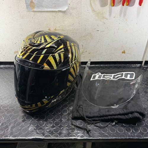 ICON Airflite helmet size M 58cm used with black-gold holographic design