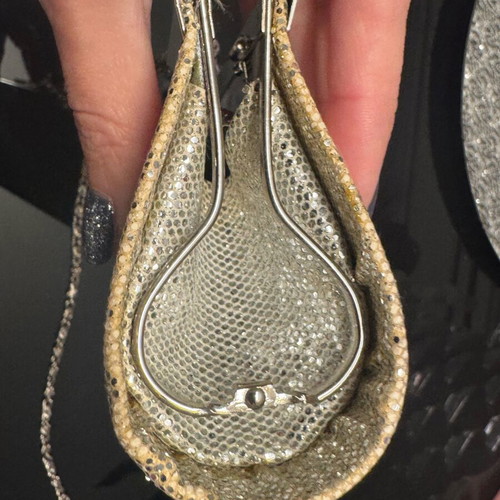 Evening handbag like new in champagne color with chain