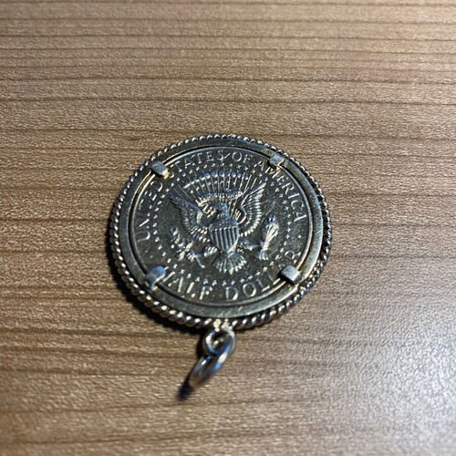 Collectible pendant large 1968 half dollar coin with silver wreath, like new