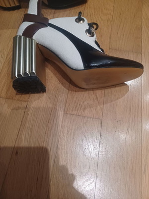 Booties new, size 38, white and black