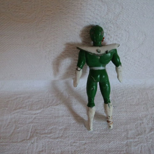 Small action figures used, approx. 8cm, including Power Rangers and Archaeopteryx
