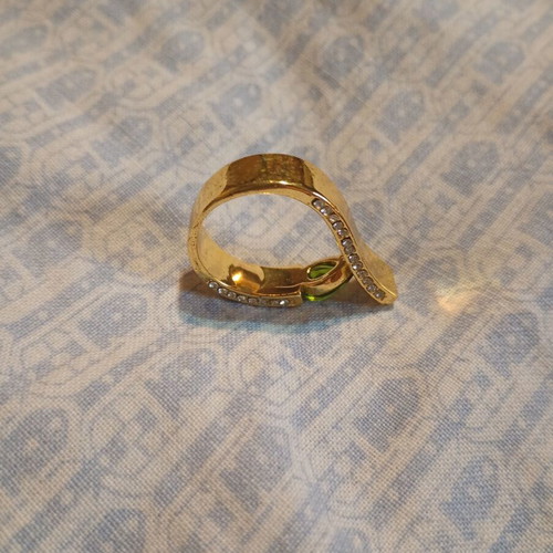 Ring with diamonds and green zircon, new