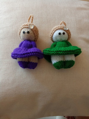 Knitted dolls pair handmade with needles