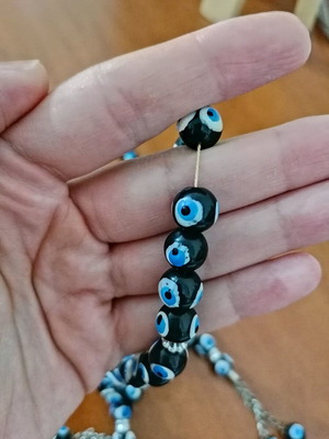 Worry beads like new with eye design, two pieces