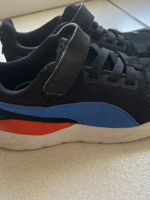 Puma athletic shoes size 30 used, black with orange and blue details