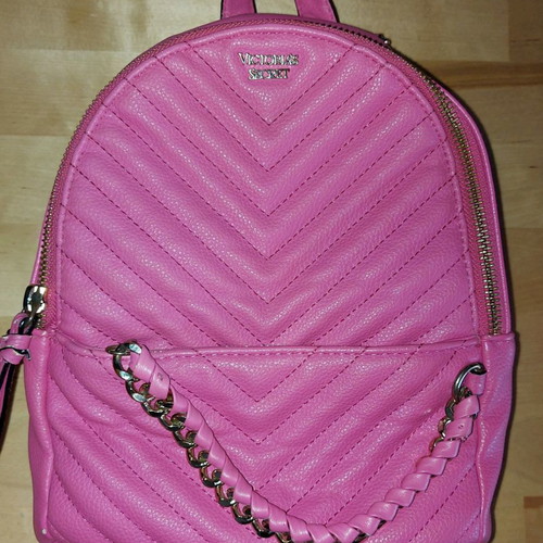 Victoria's Secret mini backpack used, fuchsia with gold details