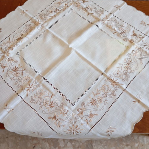 Ecru semi-linen tablecloth with beige floral embroidery and handmade cutwork
