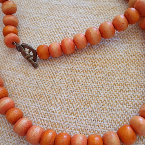 Orange long wooden necklace like new