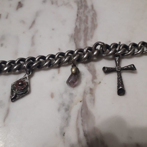 Vintage bracelet like new with silver hanging charms