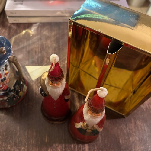 Santa Claus candles and ceramic lantern lightly used