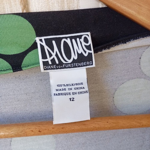 Diane Von Furstenberg wrap dress silk like new, black with green circles