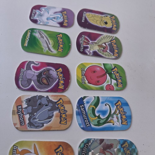 Pokemon metal tags used, set of 10 from 2006