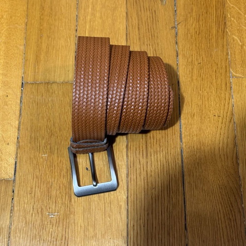 Leather belt like new in tanned color with embossed design 130cm