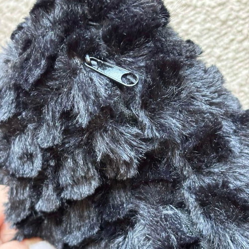 Wide fur pillow like new, black with removable fabric