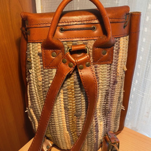 Vintage backpack with leather and woven multicolor design like new