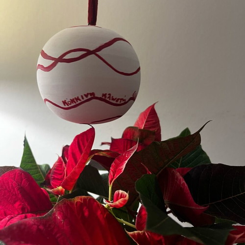 Christmas ceramic ball new with red thread
