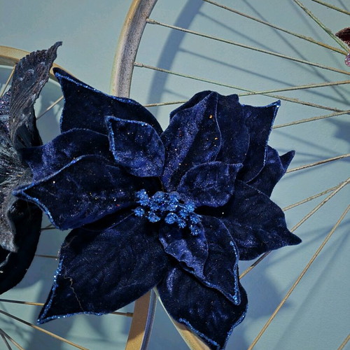 Christmas flowers used, dark blue decorations