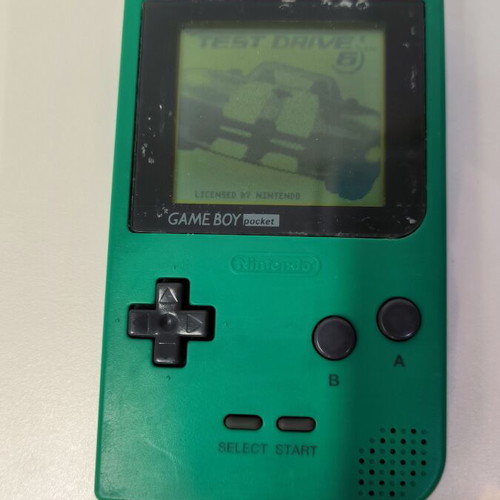 Game Boy Pocket Green console used with Test Drive 6 game