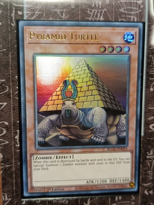 Pyramid Turtle Yu-Gi-Oh! card like new with Ultra Pro sleeve