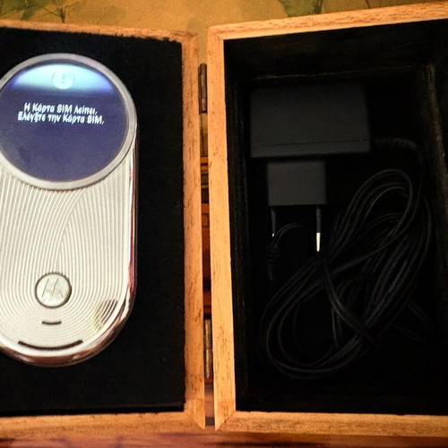 Motorola Aura used silver mobile phone