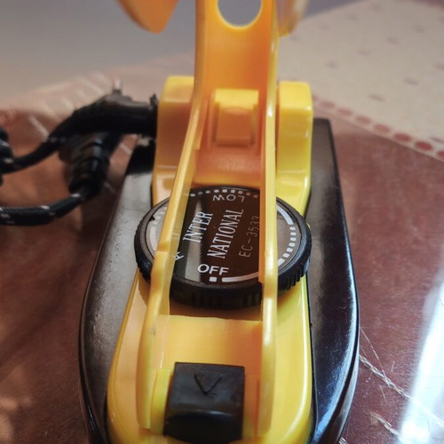Mini travel iron 1980s, new
