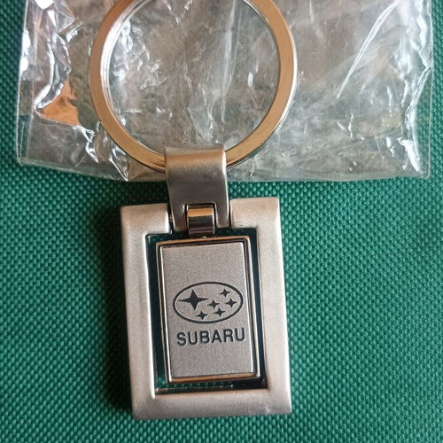 Vintage Subaru spinning keychain New Old Stock NOS heavy metal 37.45g