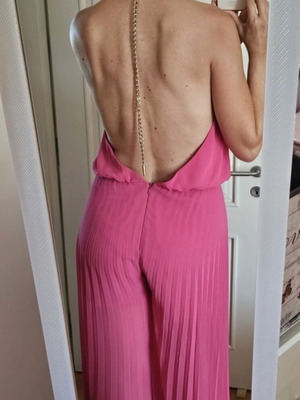 Zini Boutique pleated backless jumpsuit with gold chain, size L