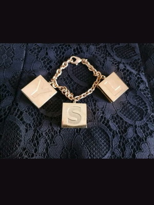 Yves Saint Laurent collectible bracelet used with eyeshadow compartments