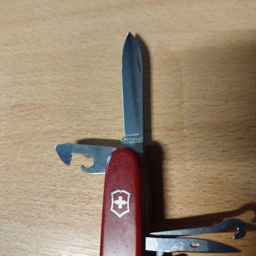 Leatherman Sidekick, Victorinox Swiss, and Opinel No6 knives like new