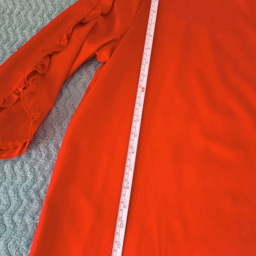 Women's red blouse with ruffles like new, size L