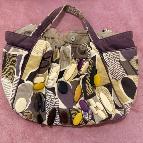 Accessorize fabric shoulder bag like new with decorative stones