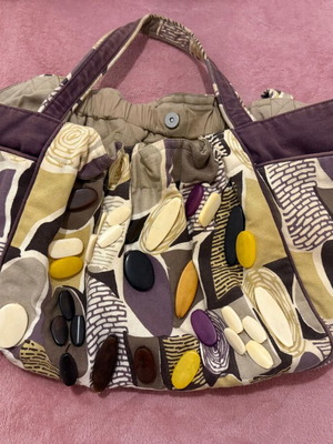 Accessorize fabric shoulder bag like new with decorative stones