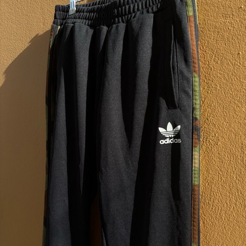 Adidas Originals women's black sweatpants with camouflage stripes like new