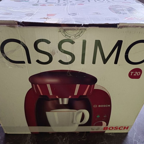 Tassimo coffee machine like new with capsules