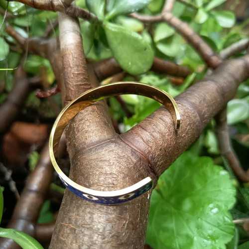 Steel bracelet with enamel like new, gold color