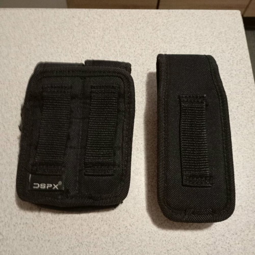 Pistol magazine holders used, one single and one double, black