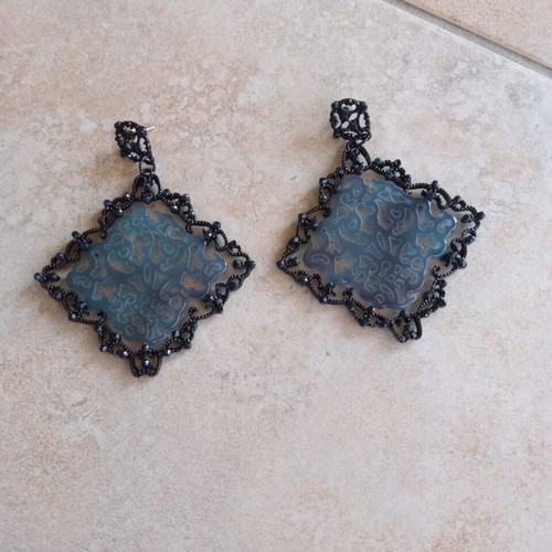 Earrings new made of metal, plastic and small black crystals