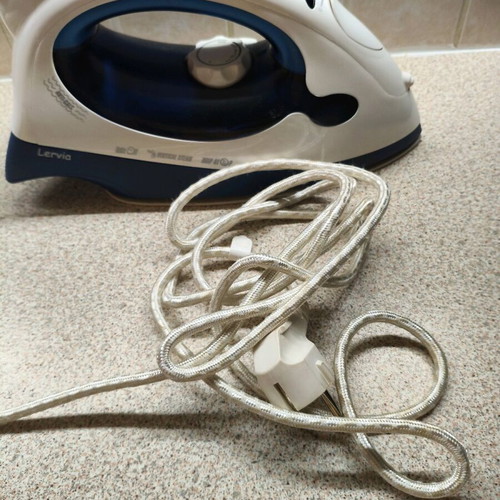 Lervia clothes iron used with Drip‑Stop function