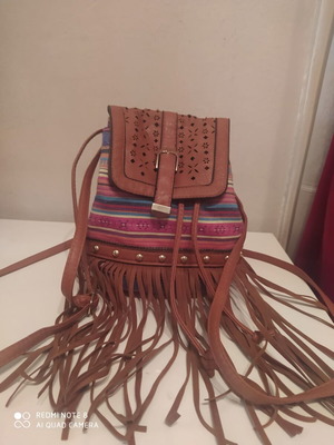 Backpack with fringes like new, brown