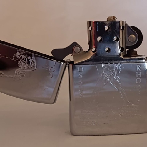 Zippo Colossus of Rhodes lighter used, laser engraved, made in USA