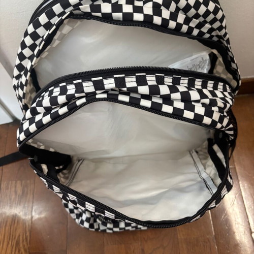 Jansport black and white checkerboard backpack with laptop compartment