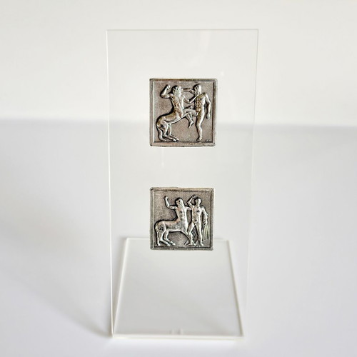 Set of 2 stands with 2 silver Parthenon sculpture depictions