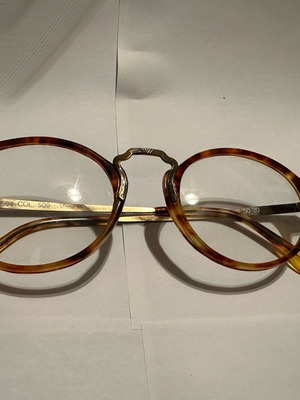 Vintage K+B eyeglasses Made in Italy with round tortoiseshell frame and brass details