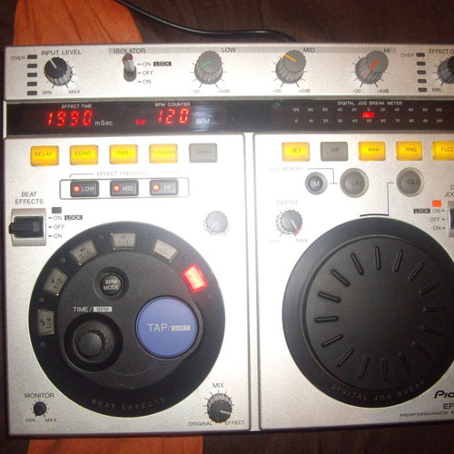 Pioneer DJM-500 mixer and Pioneer EFX500 silver effect processor used