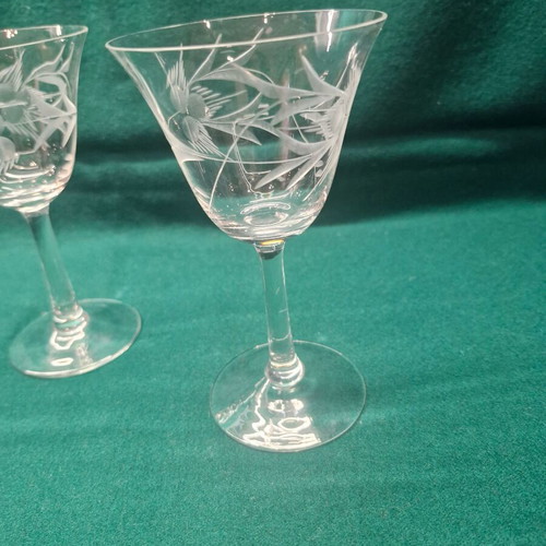 Stemmed wine glasses with engraved design, set of 5, like new