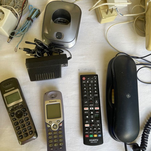 Set of old cables, sockets and telephony devices used