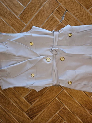 Pirouette women's beige vest like new with belt