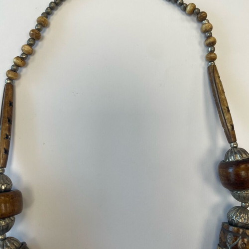 Long necklace with carved wooden and metal beads used, South Africa