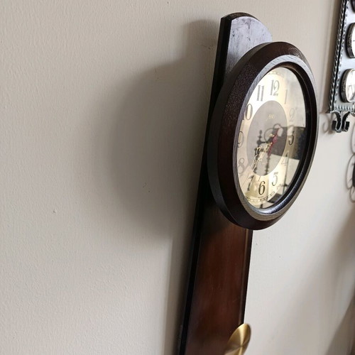 Battery Pendulum Wall Clock like new