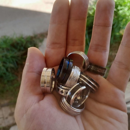 Rings medium size, black and silver, like new, set of 10